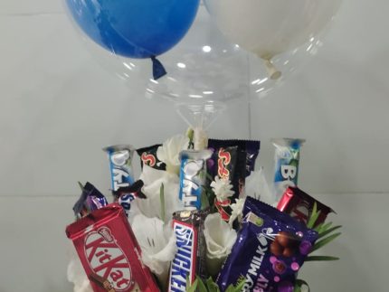 Flowers and chocolates balloon basket